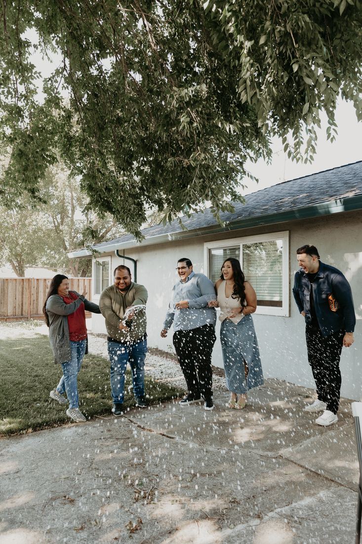 Family and friends gathered in the backyard on closing day