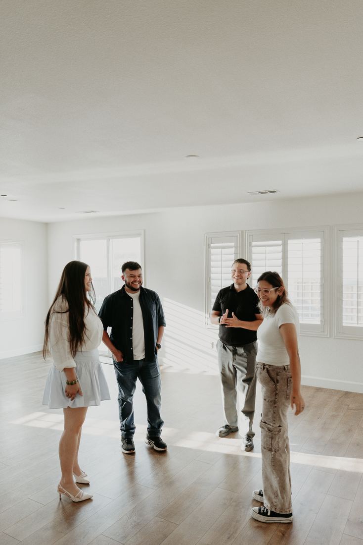 Couple in their new home on closing day