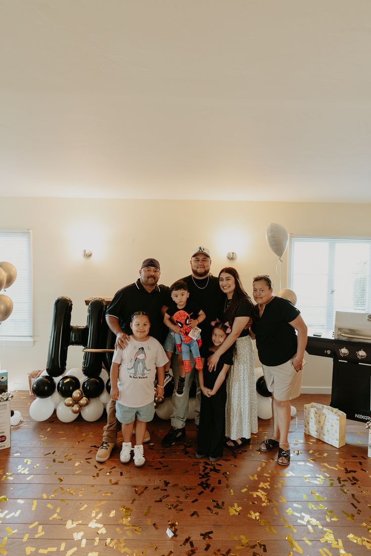Closing day family celebration in their new living room